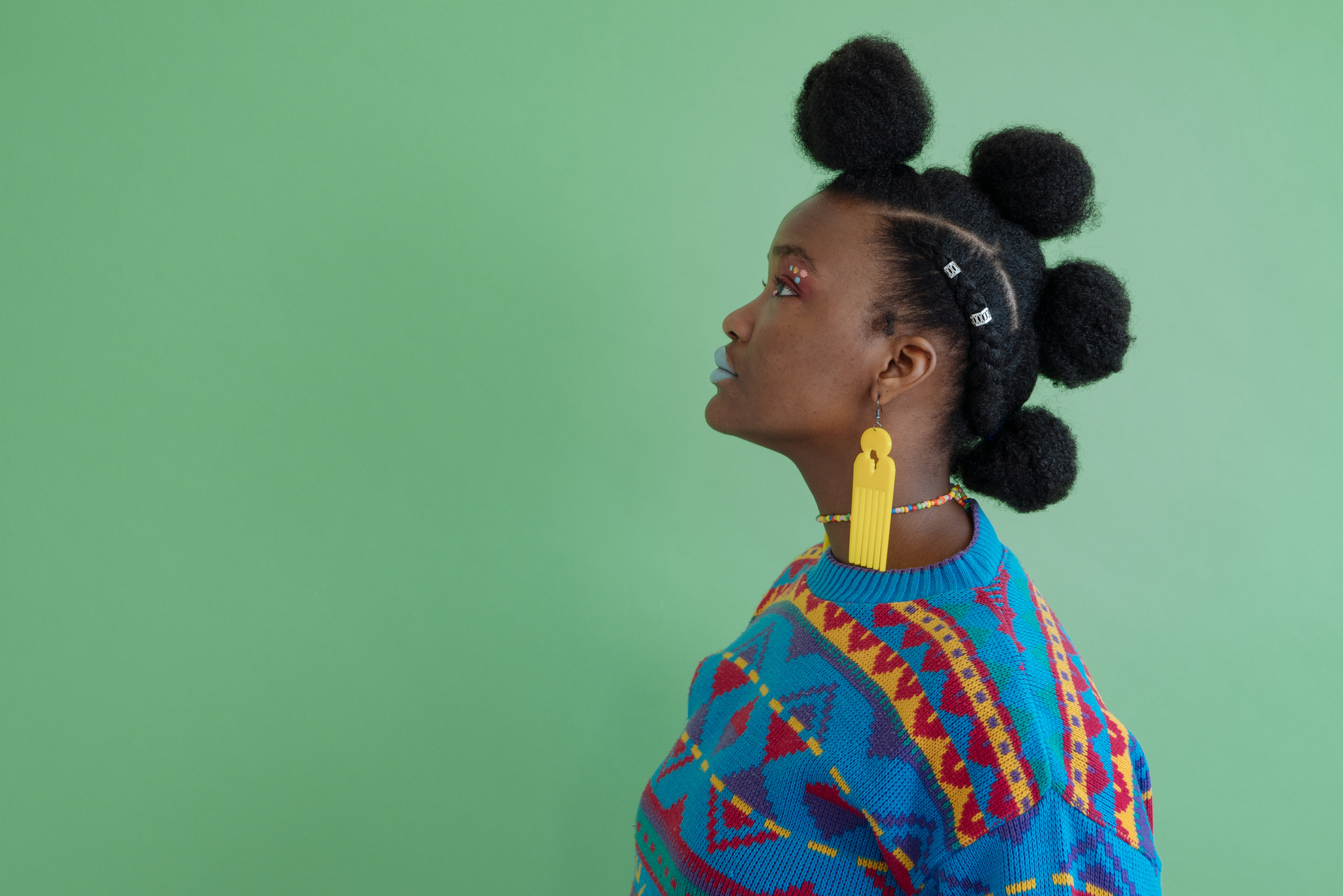 Woman with Afro Puff Buns Hairstyle